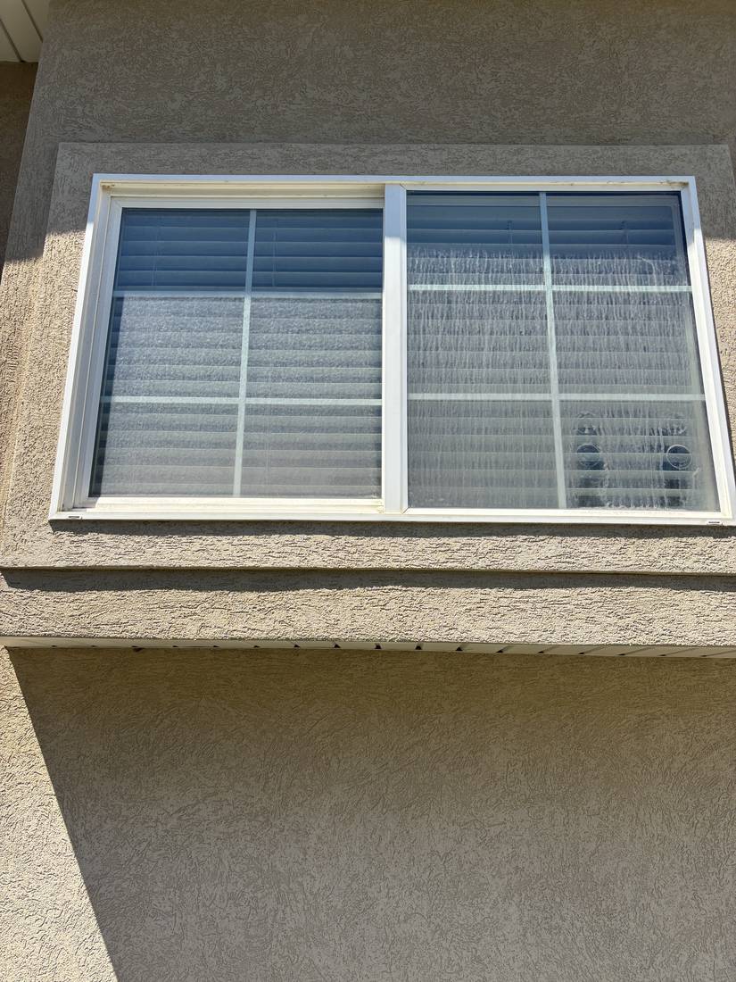 Streak-free window washed clean, interior and exterior glass